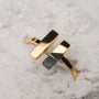 "Campania Ring", modern ring featuring marble and gold elements with a sleek design.