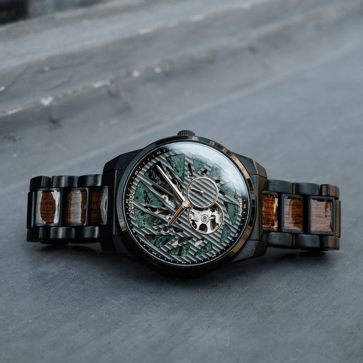 "Adrenin watch featuring a Cat's Eye pattern and walnut accents, with an intricate dial design and stylish metal band."