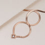 "Awakening Necklace" necklace in rose gold, featuring a sleek and elegant nacre design.