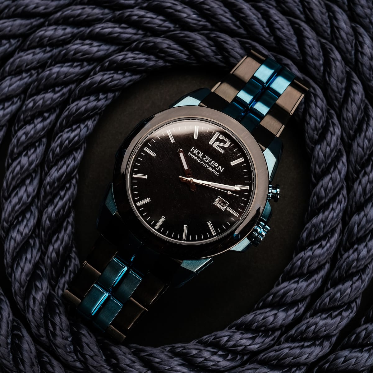 "Glaciersurge" wristwatch featuring a sleek design with Hawk’s eye face and maple accents.