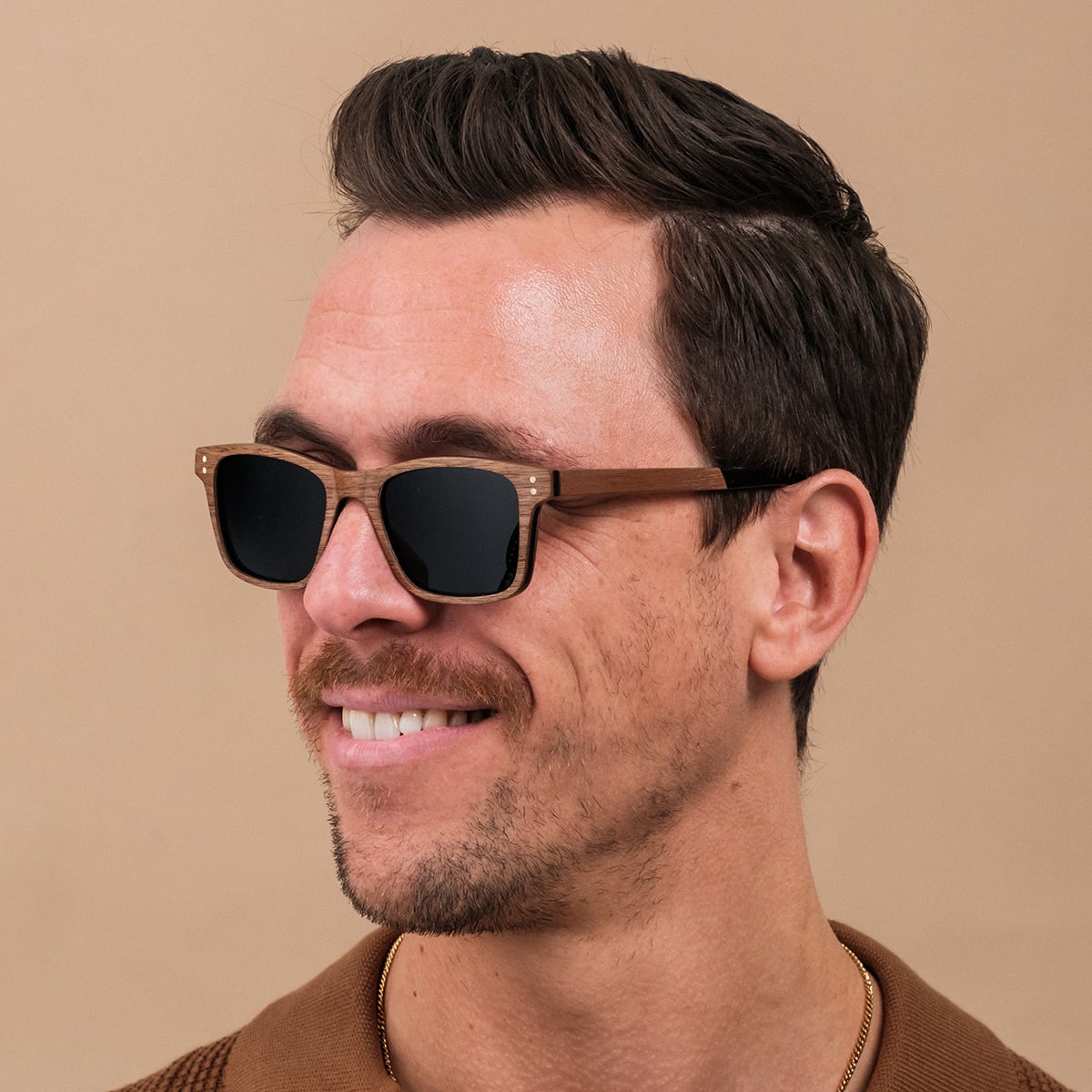 "The Extrovert" sunglasses, walnut frame, sleek and stylish design.
