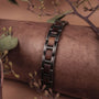 "Acoustic" bracelet, blending walnut wood with an antique silver finish for a rustic, elegant style.