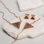 Scale Earrings: Elegant walnut and rose gold triangle earrings with a modern design.