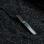 "Campania Necklace" necklace featuring green marble and Damascus steel with a sleek, modern design.