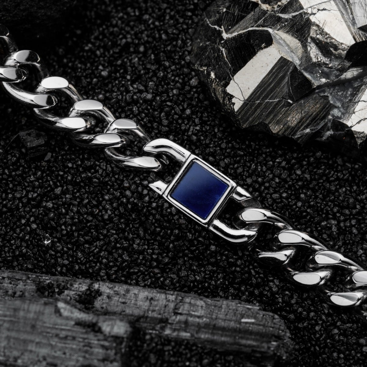 "Bodyguards Strap" bracelet featuring a marble and silver design with a modern aesthetic.