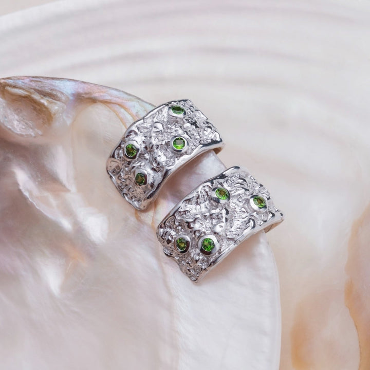 "Silverstream Earrings" - Elegant earrings featuring diopside stones and a textured silver design.