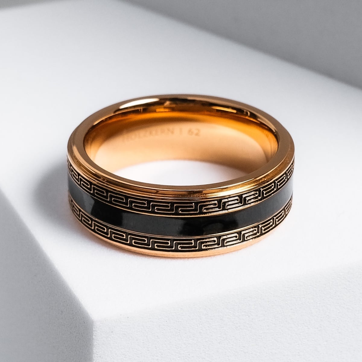 "Numerary Ring" - elegant ring featuring maple and gold with intricate black accents.