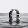 "Fractional Ring" - Elegant ring featuring walnut and silver accents with a sleek, modern design.