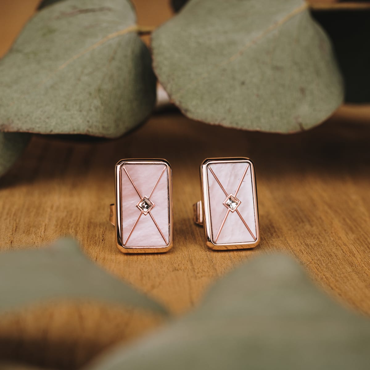 "Aquarell Earrings" earrings feature a chic nacre and rose gold design with a rectangular style for elegant appeal.