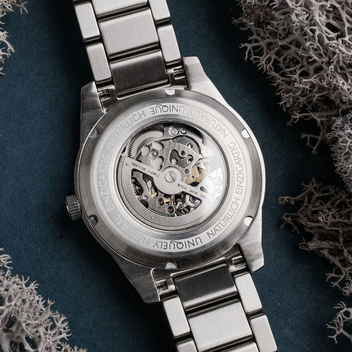 "Spikes wristwatch with a sleek mechanical design and stainless steel band."