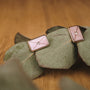 "Aquarell Earrings" earrings, featuring a nacre and rose gold design with a modern rectangular style.