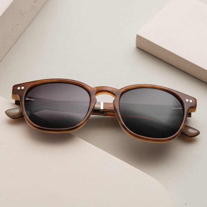 "The Comedian" sunglasses with a classic walnut and honey design.