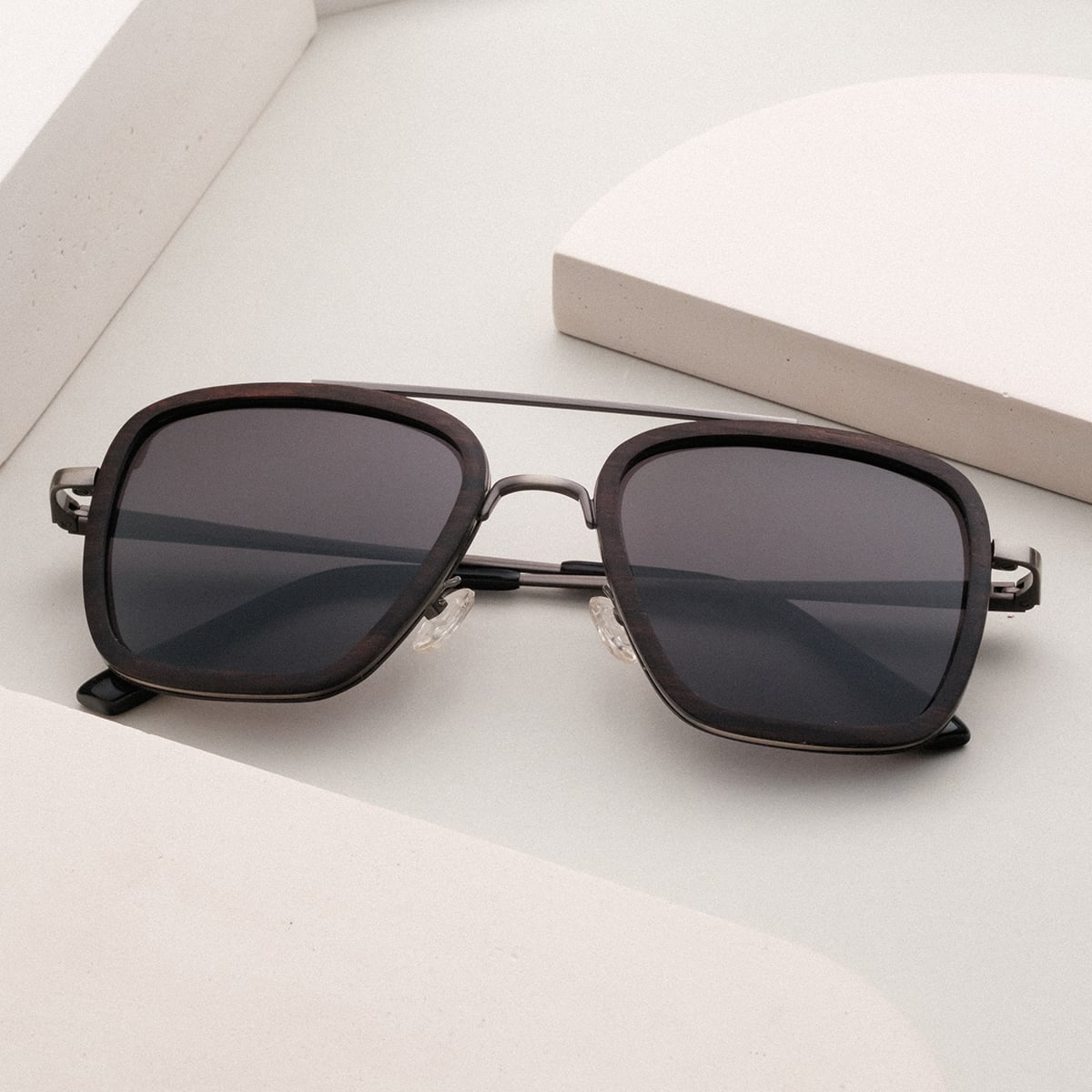"The Logician", stylish sunglasses featuring a Leadwood frame and Antique Silver accents.