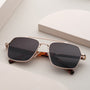 "The Professor I" sunglasses featuring Padauk and matte gold accents in a modern design.