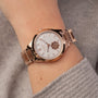 "Kaleidoscopic" watch with nacre and koa materials, showcasing an elegant, rose-gold and wood-accented design.