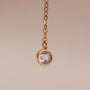 "Summersweet Necklace" necklace featuring elegant pearl and zirconia accents, suspended on a delicate gold chain.