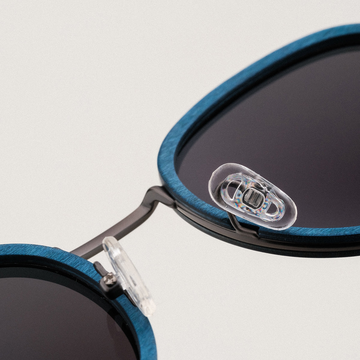 "The Loving" sunglasses featuring a sleek design with maple and dark grey accents.