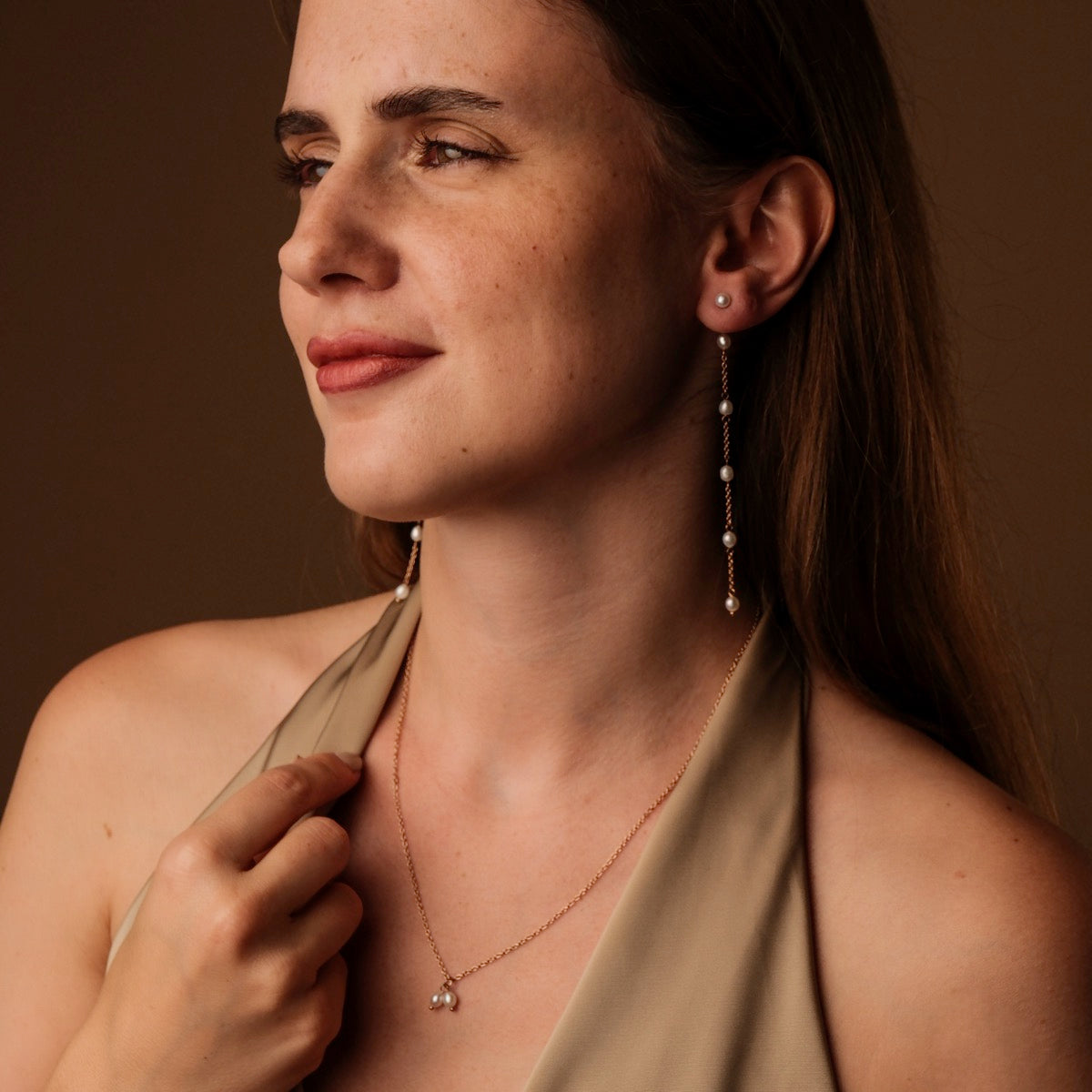 "Summersweet Earrings II": Elegant rose gold earrings adorned with pearls, showcasing a refined and sophisticated style.