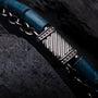 "Supersonic", stylish bracelet with maple and gray detailing among dark stones.