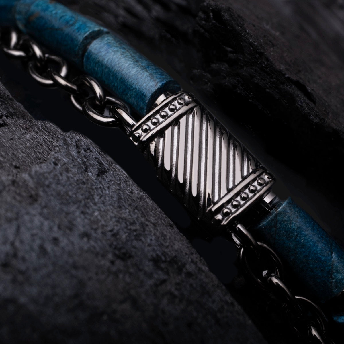 "Supersonic", stylish bracelet with maple and gray detailing among dark stones.