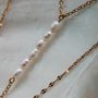 "Summersweet Necklace", a delicate necklace featuring pearls and zirconia with a sophisticated, elegant style.