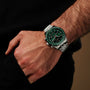 "Openhorizon" watch features a sleek green marble dial and silver bracelet, offering a sophisticated and elegant style.