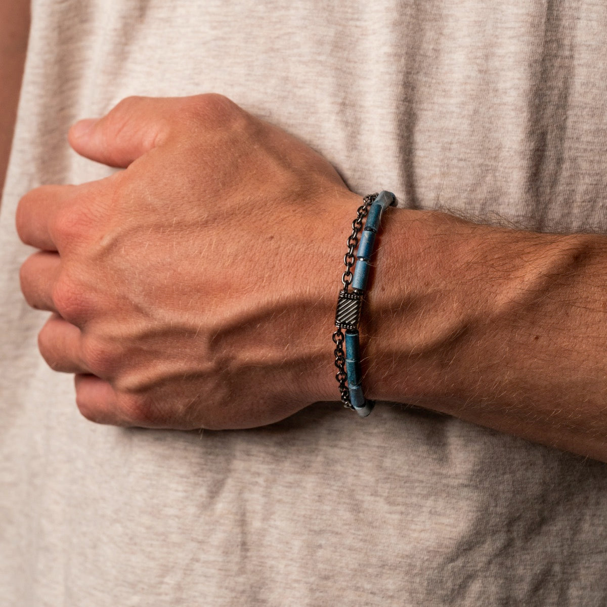 "Supersonic" bracelet featuring a maple and gray aesthetic on a person's wrist, showcasing its stylish design.
