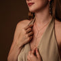 "Summersweet Necklace" necklace featuring pearl and zirconia materials in an elegant, layered design.