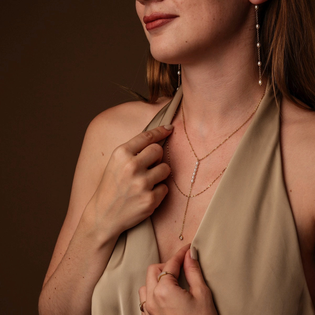 "Summersweet Necklace" necklace featuring pearl and zirconia materials in an elegant, layered design.