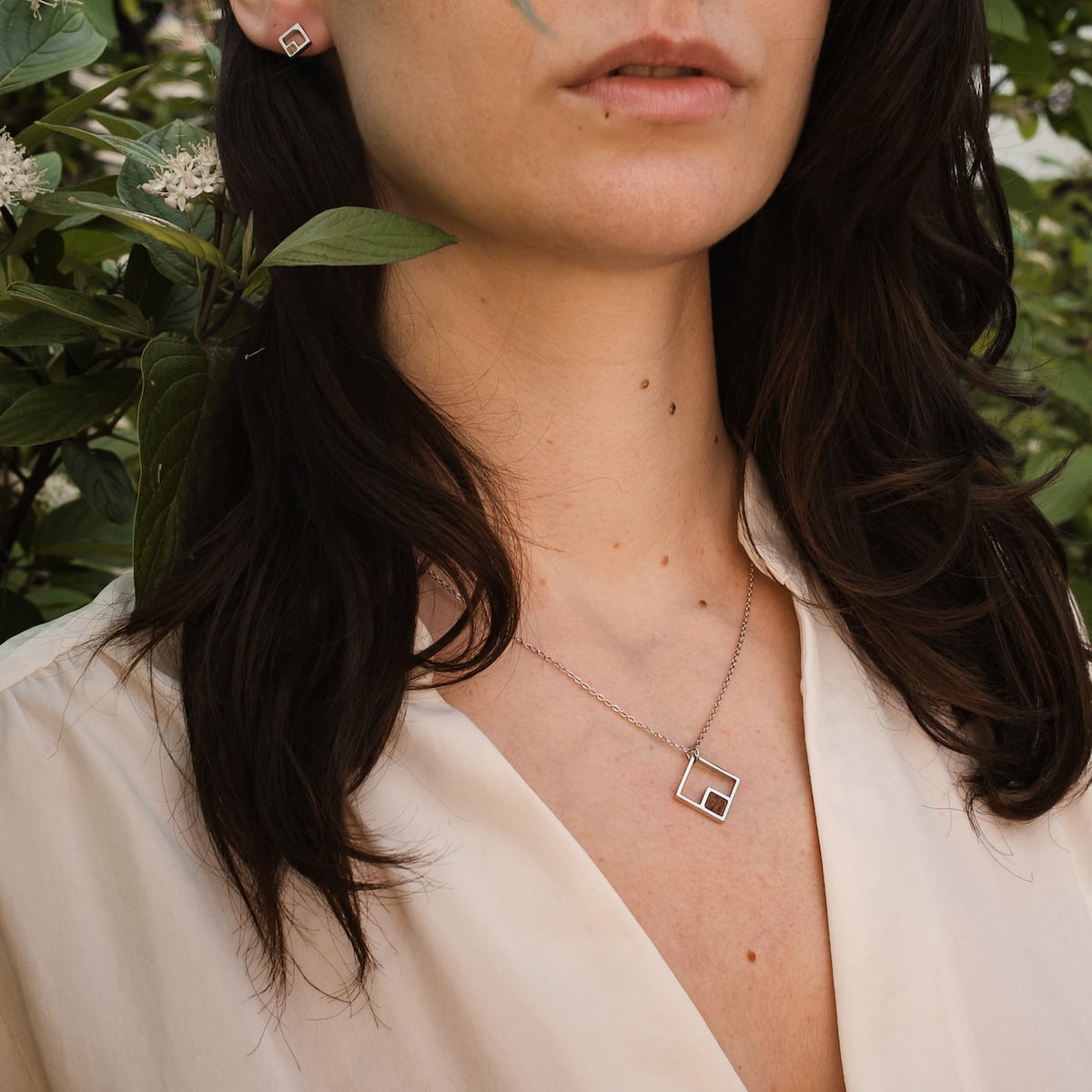 "Geometric Necklace" - a geometric necklace featuring a modern, elegant design with Koa wood and silver elements.