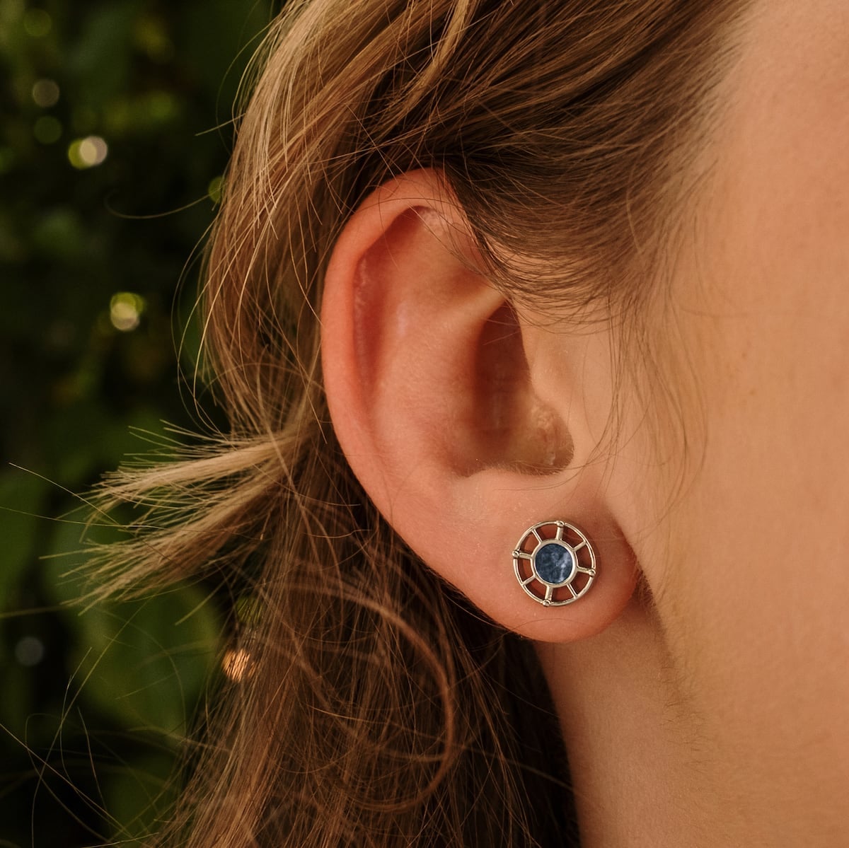 "Amulet Earrings" - Stylish marble and silver round earrings on ear.